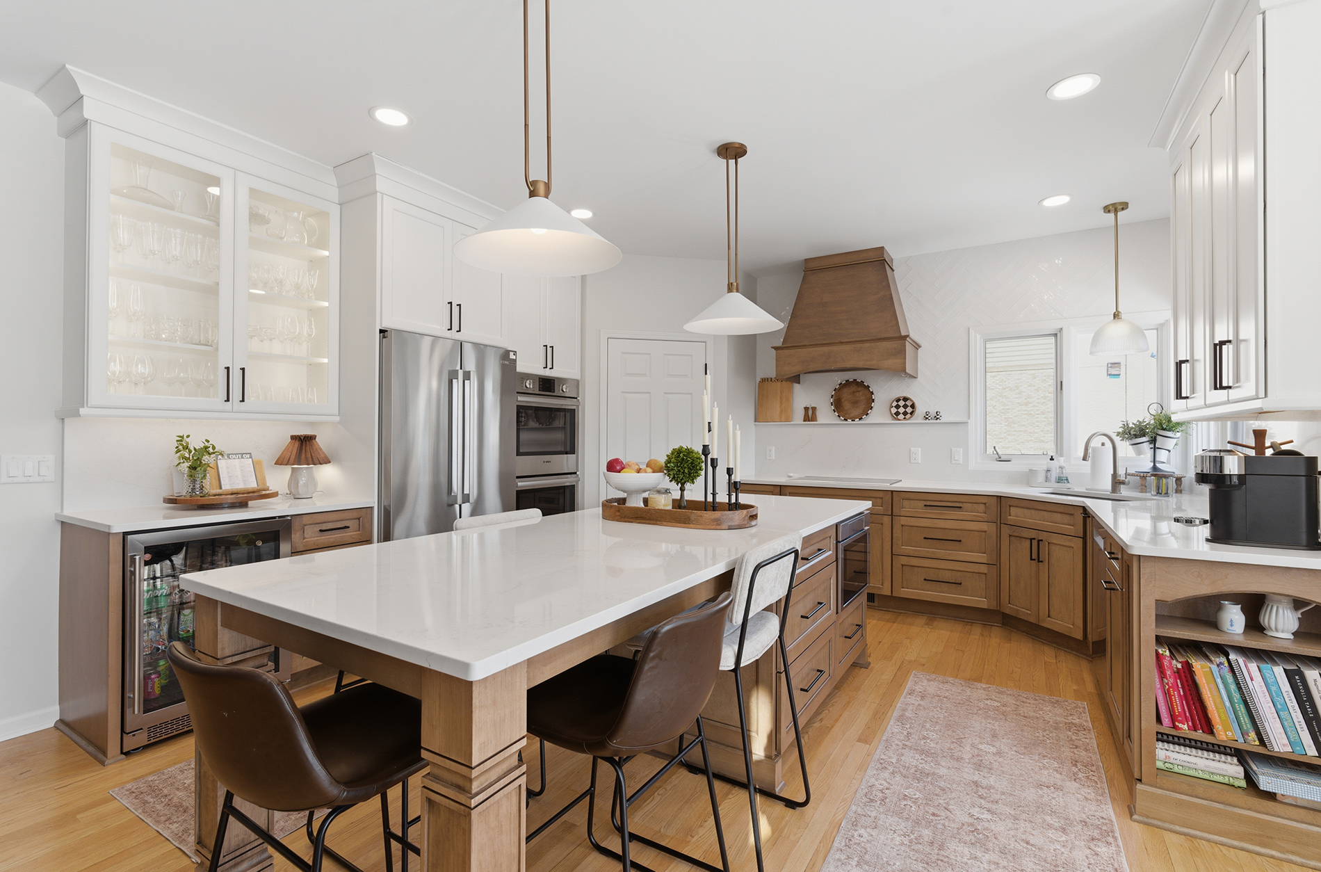 Plymouth kitchen remodel with maple and painted cabinets, large island with seating